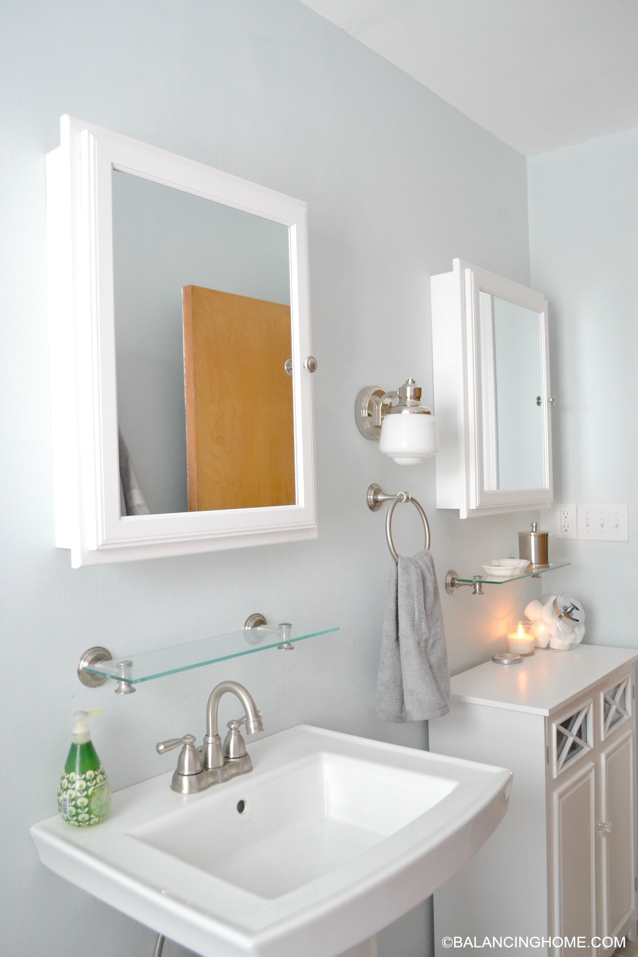 cleaning organizing bathroom with pedestal sink organizing a small