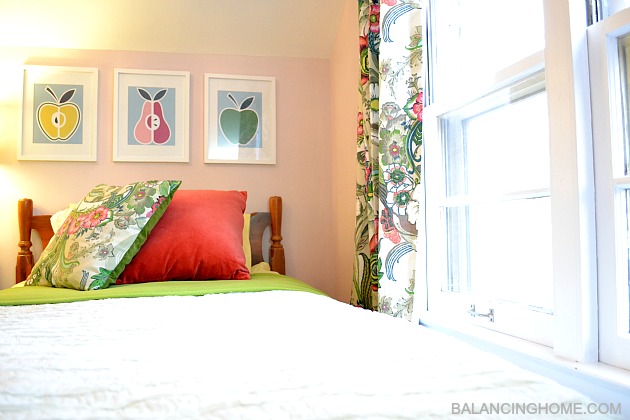 Big Girl Room Reveal- pillow from World Market napkins, ruffled bedding, DIY fruit art, World Market drapes